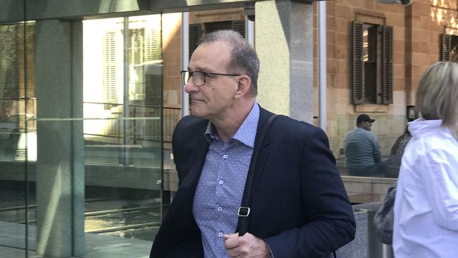 Henry Keogh is seen outside the Supreme Court in Adelaide, Friday, April 12, 2019. The full court of the South Australian Supreme Court has delivered a judgment that may allow the release of a report the previous Labor government relied on to keep Keogh behind bars. (AAP Image/Tim Dornin)