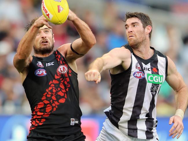 AFL Anzac Day clash between  Essendon and Collingwood at the MCG in Melbourne. Essendon's Jobe Watson and Collingwood's Tyson Goldsack.  Picture: Alex Coppel.