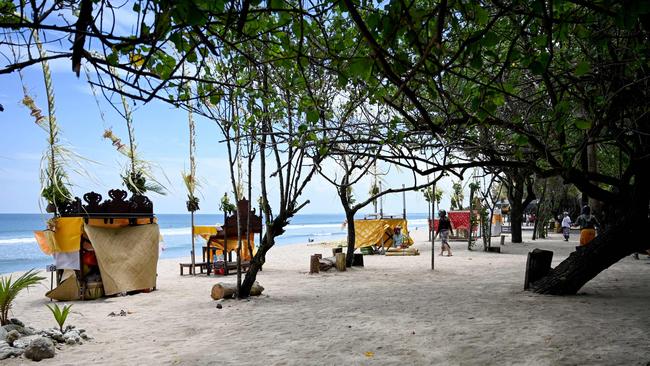 A near-empty beach in Kuta in late March. Picture: Sonny Tumbelaka.