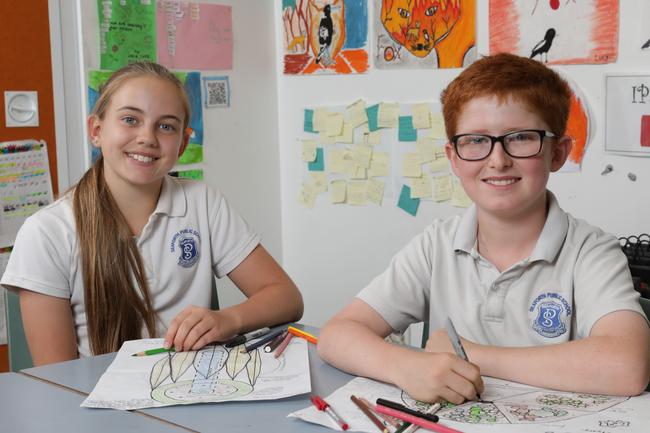 Rufus Adam and Amber Riddle, Year 6, Seaforth Public School working on their designs. Picture: Damian Shaw