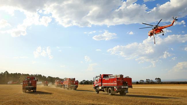 Crews set out to battle the large bushfire in Rosedale. Picture: Mark Stewart