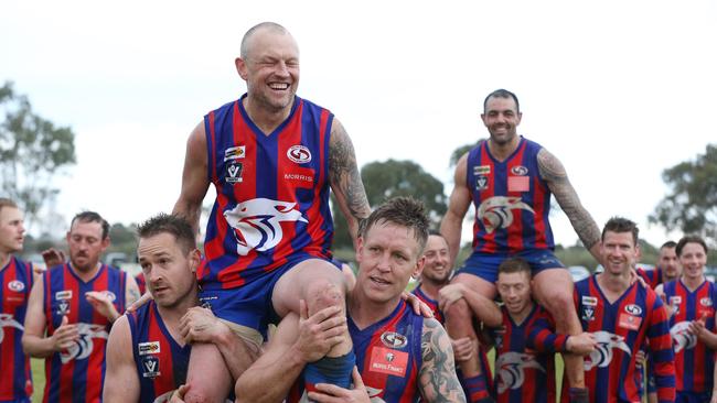 Foootball GDFL: Bell Post Hill v Geelong West. Bell Post Hill 300 games player Travis Fursland and 200 games player Tim Barton are carried off by team mates Picture: Mark Wilson