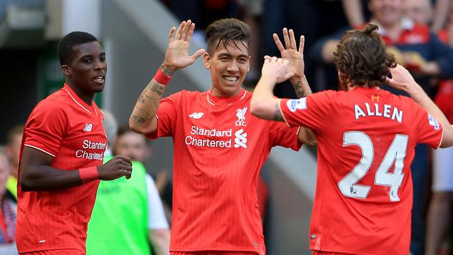 Liverpool's Roberto Firmino celebrates scoring against Watford with teammates Sheyi Ojo and Joe Allen.