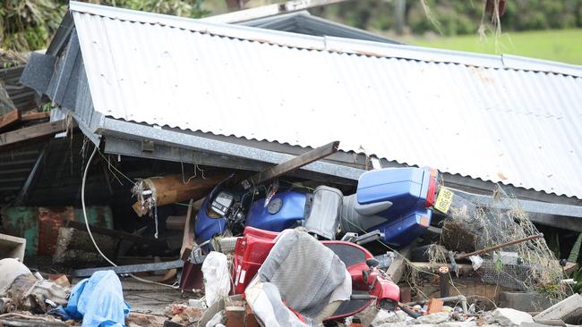 A crushed motorbike in devastated Dungog. Picture: Peter Lorimer