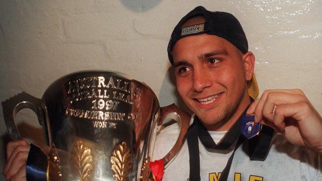 Adelaide Crows footballer Andrew McLeod wearing the Norm Smith Medal after the 1997 AFL Grand Final. Picture: Dodd Karen.