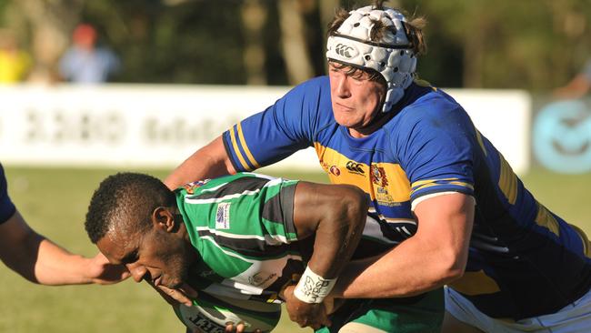 Sunnybank Dragons Vs Easts at Sunnybank Rugby Union Club at Sunnybank, Oldmac Oval. Sunnybank player Taniela Tuiranuavou with possession being tackled by Easts player Michael Stolberg.