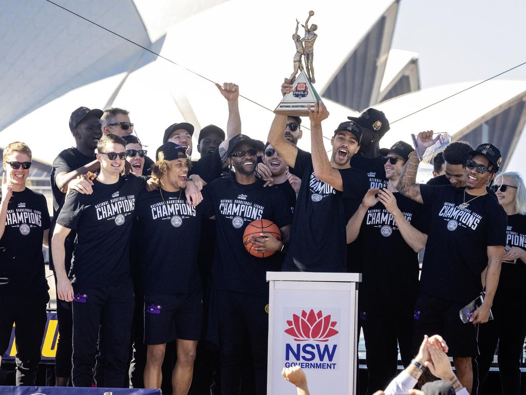 The Sydney Kings hold up the winning trophy during grand final celebrations. Picture: Jenny Evans/Getty Images.