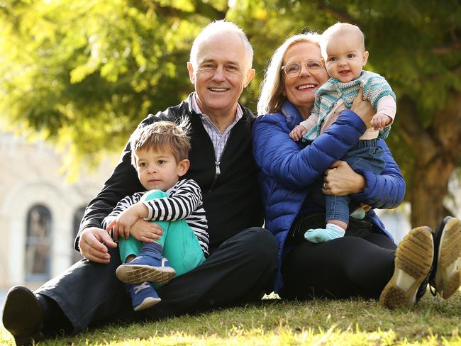 PM Malcolm Turnbull and wife Lucy pictured with their grandchildren Alice, aged 10 months, and Jack, aged three. Picture: Sam Ruttyn