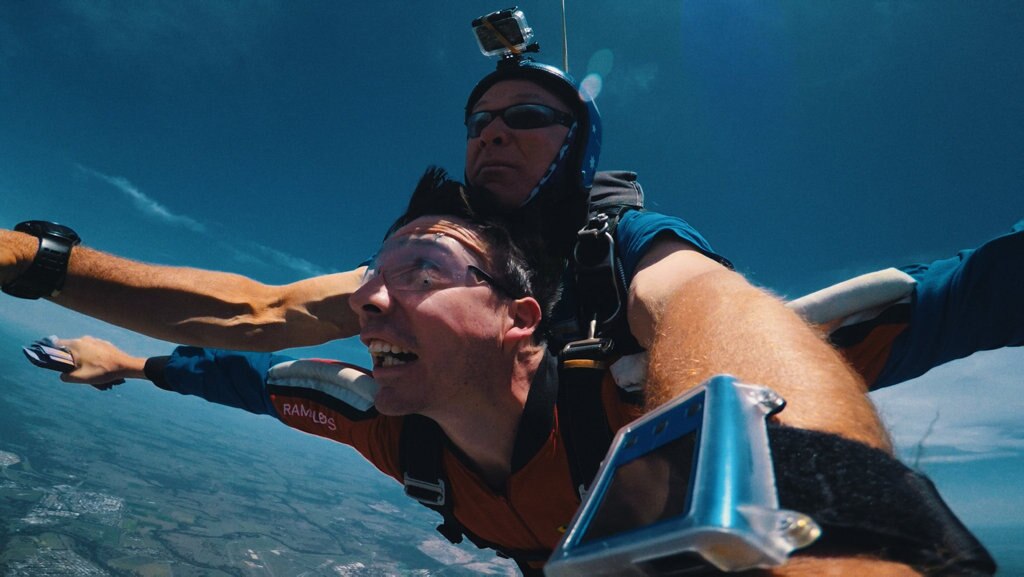 Brisbane radio host Stav Davidson dropped $10,000 in $5 notes during a skydive. Picture: Contributed