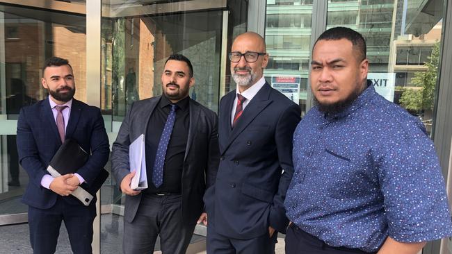 Hama Mapapalangi known by his rap name 'Mac 11', with his legal team Mohammed Wafai, Javid Faiz and barrister AJ Karim at Parramatta District Court on Tuesday. Picture: Kate Lockley