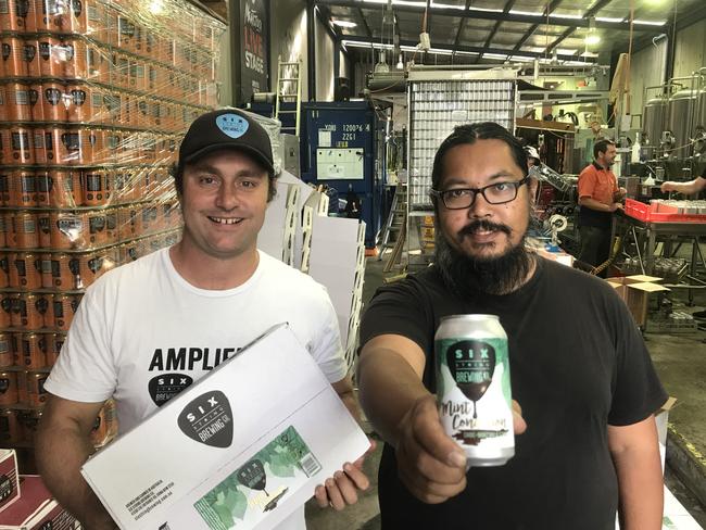 Six String Brewery co-owners Ryan Harris and Chris Benson with their latest craft beer called Mint Condition. Picture: Cathy Stubbs