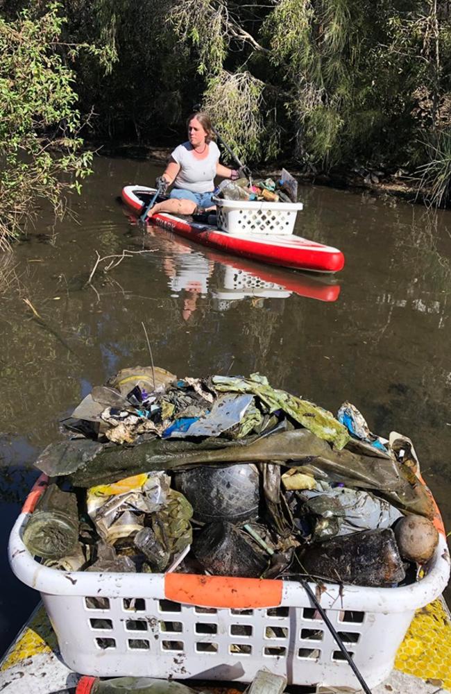 Volunteers clear Gold Coast waterways. Picture: Two Llamas Environmental &amp; Social Projects