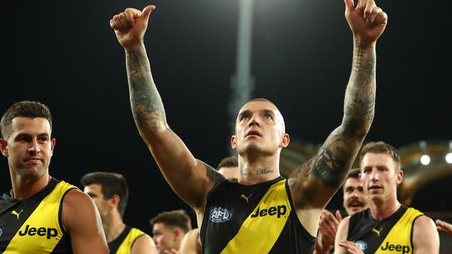 Richmond players enjoy their Round 17 win at Metricon Stadium over Geelong.