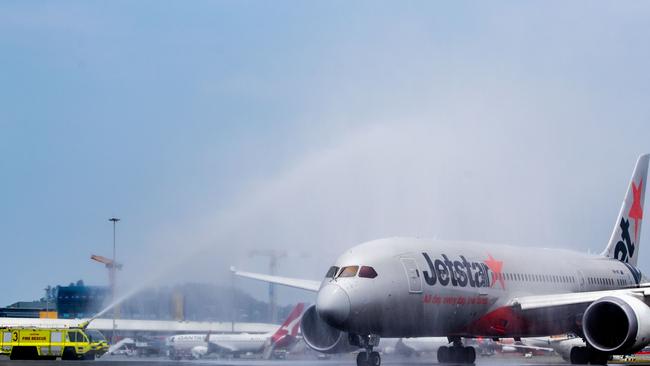 Jetstar Flight JQ49 – the inaugural direct flight to Seoul – gets the traditional water-cannon salute at Gold Coast Airport. Picture: Luke Marsden