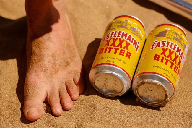 Sand and XXXX heavies, as one entrant falls apart before the start at the 2019 Beer Can Regatta at Mindel Beach. Pic Glenn Campbell