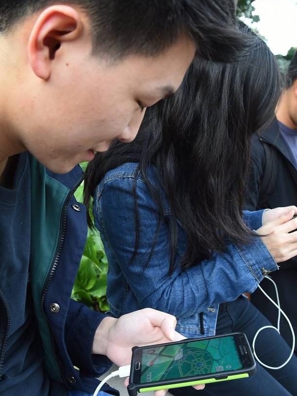 Players searching for Pokemon.
