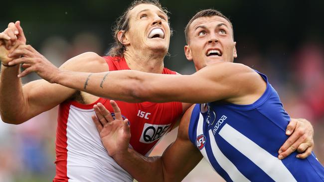 Kurt Tippett and Braydon Preuss go toe to toe in a ruck contest. Picture: Getty Images