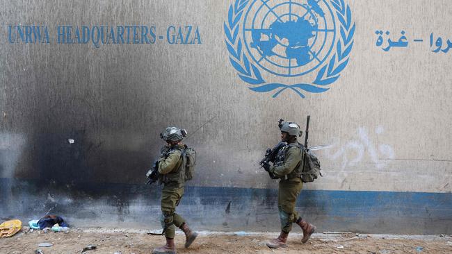 Israeli soldiers inside a compound of the United Nations Relief and Works Agency for Palestine Refugees in the Gaza Strip.