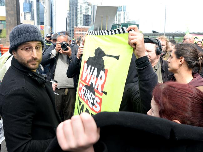 A lone pro-Israel supporter confronts peace activists. Picture: Andrew Henshaw