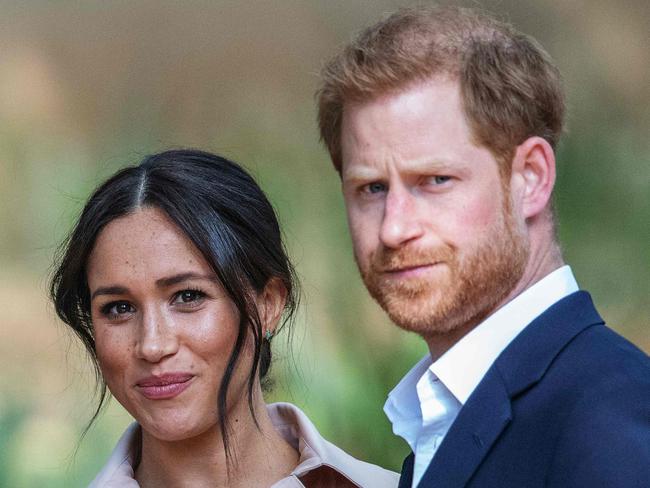 (FILES) In this file photo taken on October 02, 2019 Britain's Prince Harry, Duke of Sussex(R) and Meghan, the Duchess of Sussex(L) arrive at the British High Commissioner residency in Johannesburg. - A British newspaper group on Tuesday won a ruling to amend its defence against a high-profile claim by Meghan Markle for breach of privacy and copyright. The former television actress is suing Associated Newspapers over the publication of extracts of a letter she wrote to her estranged father before her wedding to Prince Harry in 2018. (Photo by Michele Spatari / AFP) / France OUT until 2019-10-17T00:00:00.000+02:00