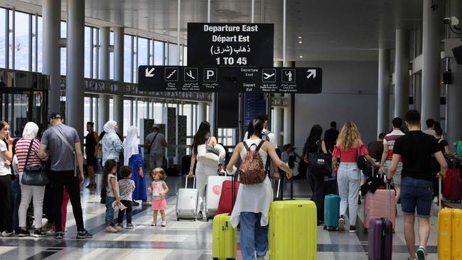 Passengers departure from Rafic Hariri International Airport in Beirut on July 29. Airlines suspended flights to Lebanon on July 29, as diplomatic efforts were underway to contain soaring tensions between Hezbollah and Israel after deadly rocket fire in the annexed Golan Heights. Picture: AFP