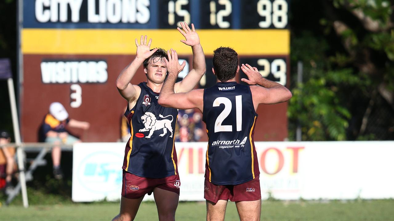 Lions' Tom Lindenmayer and Charlie O'Neill celebrate a goal in the AFL Cairns Round 6 match between the Cairns City Lions and the Centrals Trinity Bulldogs, held at Holloways Beach. Picture: Brendan Radke