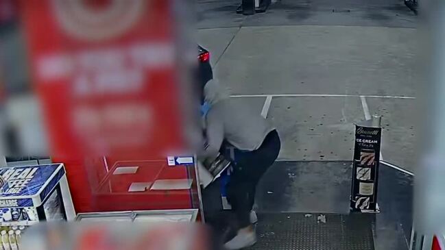 Three men, armed with a pole and a knife, raid Chambers Flat Rd servo in Logan and steal tobacco and cash