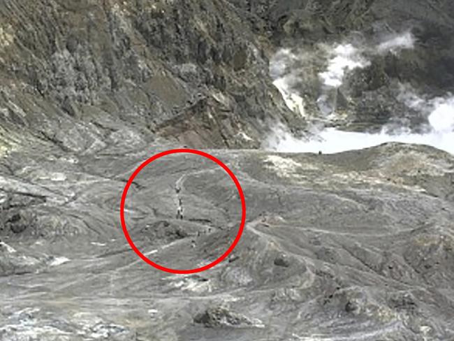 In this image released by GeoNet, tourists can be seen on a trail near the volcano's crater moments before the eruption. Picture: AP