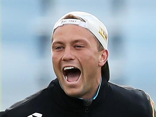 SYDNEY, AUSTRALIA - MAY 13: Matt Moylan stretches during a Cronulla Sharks NRL training session at Shark Park on May 13, 2020 in Sydney, Australia. (Photo by Matt King/Getty Images)