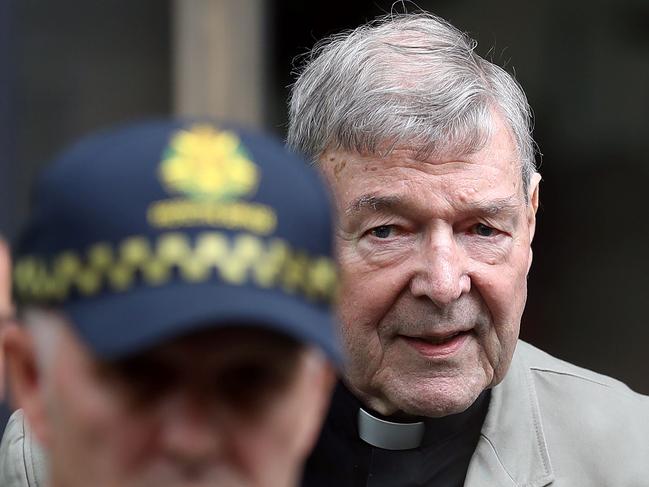 Cardinal George Pell, right, outside the County Court where he was tried. Photo: Con CHRONIS / AFP)