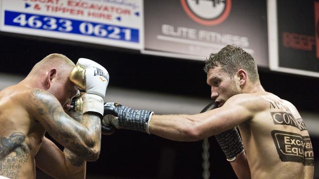 Toowoomba’s Steve Spark (right) throws a jab at Michael Whitehead during his IBF Australasian Super Lightweight title defence. Picture: Kevin Farmer