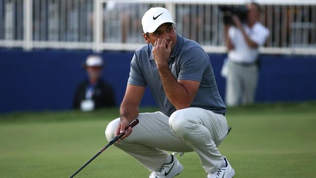 Jason Day reacts after missing a putt on the fourth playoff hole.