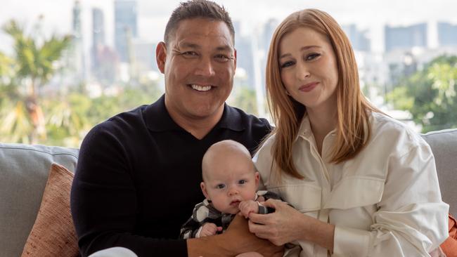 Geoff Huegill with his partner Roxan Toll and their baby boy Rafe. Picture: Erik Magelssen