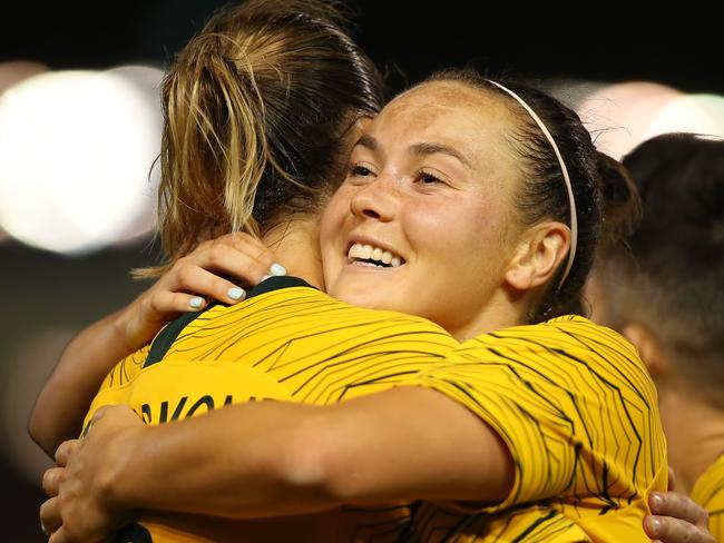NEWCASTLE, AUSTRALIA - NOVEMBER 13: Caitlin Foord of Australia hugs Emily van Egmond after scoring a goal during the International Women's Friendly match between the Australian Matildas and Chile at McDonald Jones Stadium on November 13, 2018 in Newcastle, Australia. (Photo by Tony Feder/Getty Images)