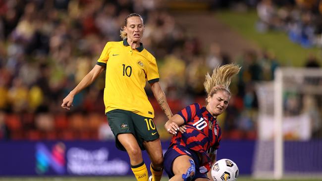 Matildas star Emily van Egmond (left) battles with America’s Lindsey Horan at McDonald Jones Stadium last month. Picture: Mark Kolbe/ Getty Images