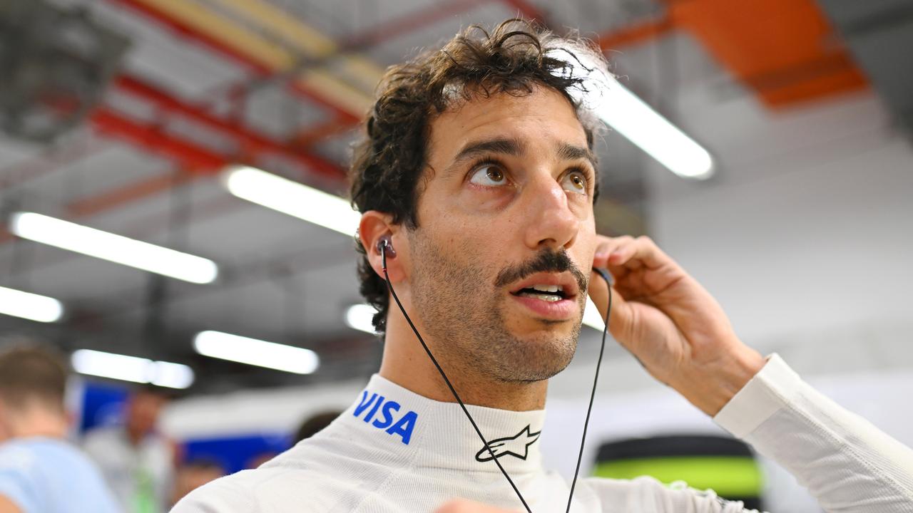 SINGAPORE, SINGAPORE - SEPTEMBER 22: Daniel Ricciardo of Australia and Visa Cash App RB prepares in the garage prior to the F1 Grand Prix of Singapore at Marina Bay Street Circuit on September 22, 2024 in Singapore, Singapore. (Photo by Rudy Carezzevoli/Getty Images)