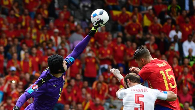 Czech Republic's goalkeeper Petr Cech (L) stops the ball.