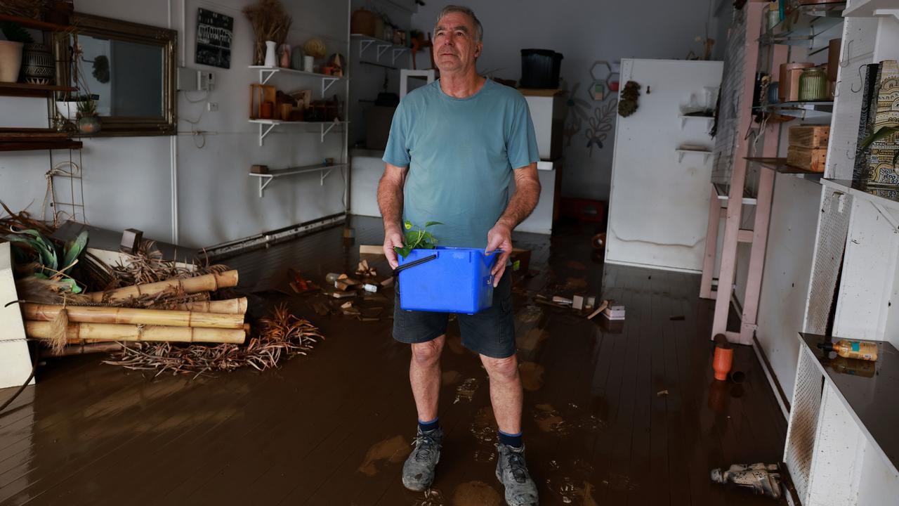 Tragic clean up after deadly floods