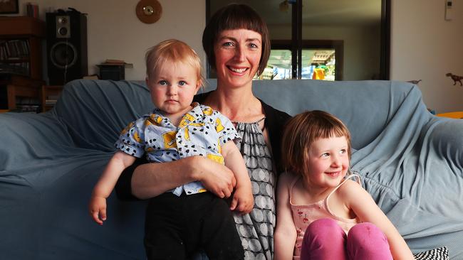 Alison Johnson with children Elywn Griffiths 1 and Eila Griffiths 3 at home in South Hobart. Alison has been waiting for some time for removal of a kidney that has failed and has now been forced to go through the private health system. Picture: NIKKI DAVIS-JONES