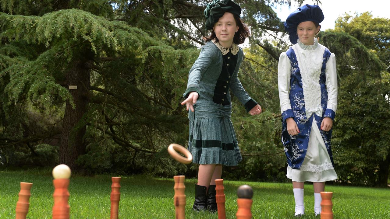 Children in old-fashioned costumes playing children’s games from the 1800s. Picture: Kris Reichl