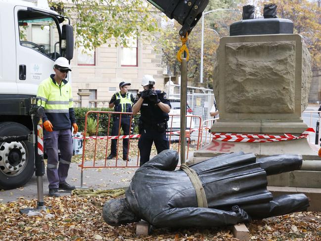 Council workers remove the statue.  The William Crowther statue in Franklin Square Hobart has been vandalised overnight resulting in the statue being removed from it's plinth and then removed by Hobart City Council.  Picture: Nikki Davis-Jones