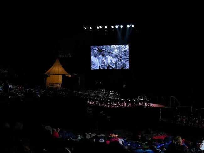 Hundreds of Australians and New Zealanders watch a documentary at Anzac Cove in Gallipoli ahead of the Anzac Dawn service. Picture: Getty Images