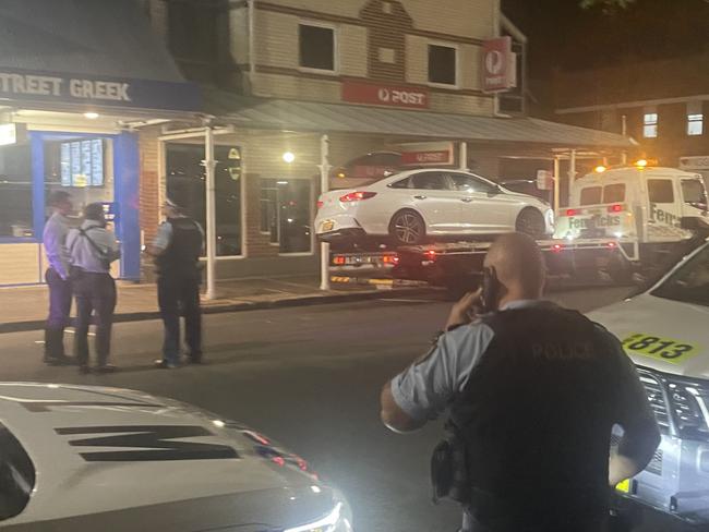 A stolen Hyundai Sonata is taken away after being seized on Beaumont St at Hamilton where four youths were arrested on March 24, 2024. Picture: Dan Proudman