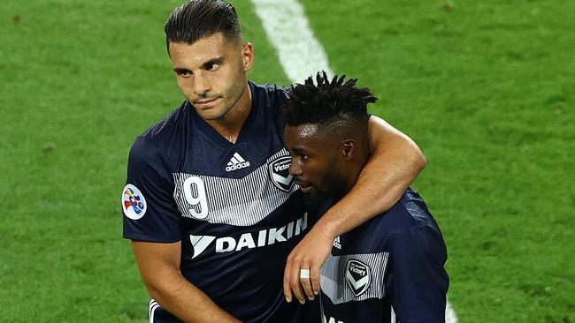 Elvis Kambosa celebrates Victory’s big win with Andrew Nabbout.