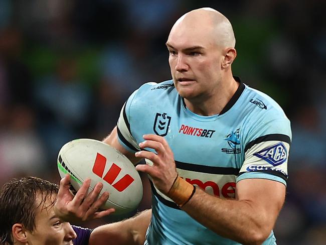 MELBOURNE, AUSTRALIA - MAY 11: Tom Hazelton of the Sharks (R) runs with the ball during the round 10 NRL match between Melbourne Storm and Cronulla Sharks at AAMI Park on May 11, 2024 in Melbourne, Australia. (Photo by Graham Denholm/Getty Images)