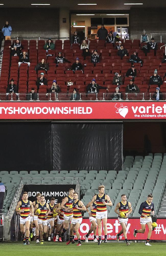 Rory Sloane leads out the Crows at the Showdown. Picture: Sarah Reed