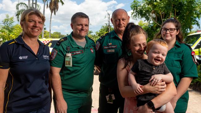 16-month-old Patrick McLean was lucky to make a healthy recovery after a near drowning incident in his family’s backyard pool two weeks ago. Pictured with Patrick is CareFlight nurse Ulrike Ganske, SJA paramedic John Payne, SJA intensive care paramedic Jeff Buteux, Patrick’s mum Amy Newton and SJA emergency medical dispatcher Billie Turner. Picture: Che Chorley