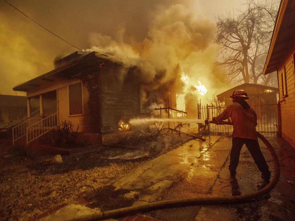 A firefighter battles the Eaton Fire January 8 in Altadena, California. Picture: Ethan Swope / AP