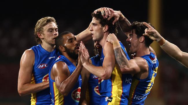 SYDNEY, AUSTRALIA - JULY 18: Ben King of the Suns celebrates a goal during the round 7 AFL match between the  Sydney Swans and the Gold Coast Suns at Sydney Cricket Ground on July 18, 2020 in Sydney, Australia. (Photo by Ryan Pierse/Getty Images)