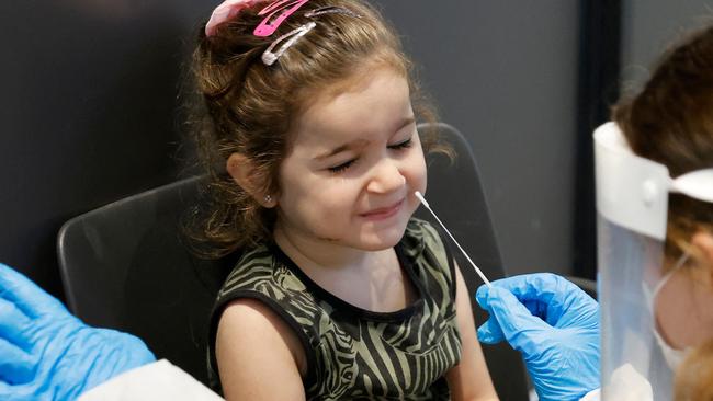 An Israeli child undergoes an antigen test in order to visit the LEGO Space Park exhibition in Tel Aviv. Picture: Jack Guez/AFP